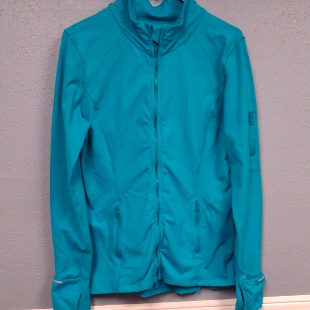 Blue Ski Jacket with Fitted Silhouette and High Collar. Hiking, Sport Outdoor